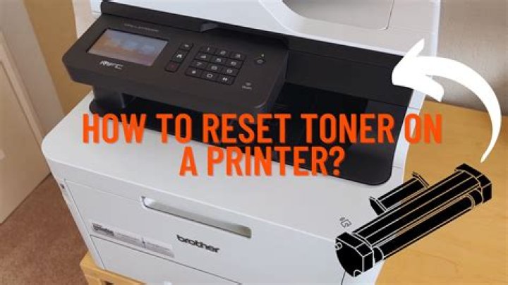 How do I reset my toner DCP 7055?